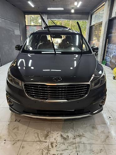 kia optima2016: Kia Carnival minivan - Kuzov: qrafit-boz rəng, xrom ön barmaqlıq və — 1