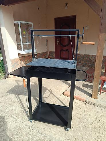 Sve za roštilj: Podesivi roštilj u dimenziji rešetke 65x45 cm Rešetka je izrađena od — 4