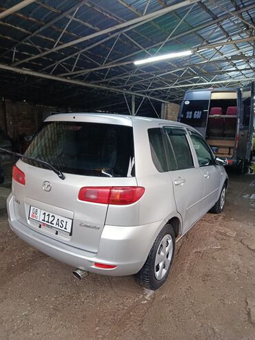 шипованные шины: Mazda Demio: 2003 г., 1.3 л, Вариатор, Бензин, Седан