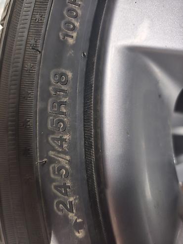 e6 3: Комплект колес: литые диски R18 + зимние шины 245/45 R18 - Диаметр — 3