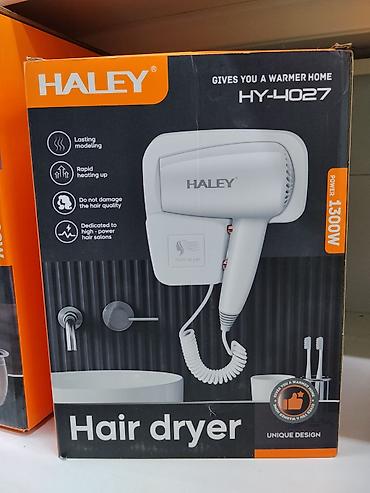 Настенный фен HALEY HY-4027, мощность 1300 Вт. Модель предназначена