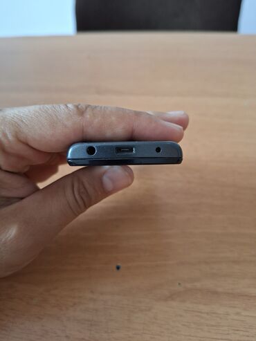nokia lumia 520 купить: Nokia 700, цвет - Черный