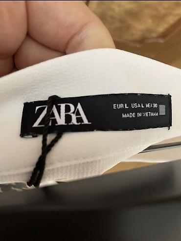 Ətəklər: 1. Новая юбка Mango размер л цвет хаки 35м 2. Белая Юбка Zara размер л — 12