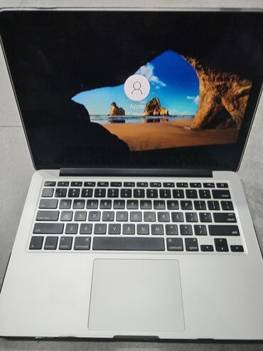Apple MacBook: Apple MacBook noutbuku - Gümüş/alüminium korpus, qara arxa qapaqda -da lalafo.az — 1 Apple MacBook: Apple MacBook noutbuku - Gümüş/alüminium korpus, qara arxa qapaqda — 1