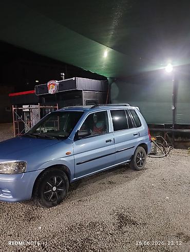 e500 124: Mazda Demio: 2001 г., Хэтчбэк — 2