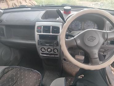 анотомический руль: Nissan Cube: 2002 г., 1.3 л, Автомат, Бензин, Хэтчбэк — 1