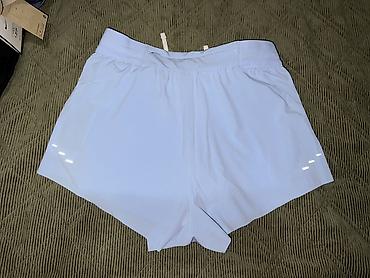 sorts i kosulja: NIKE Swift 2 in 1 2.5in Women's Running Shorts vel. S NOVO
HJ — 4