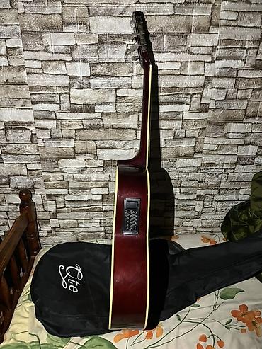 gitara qiymətləri: 200 manata alinib demek olar ki yenidir. Yeni simler ve çantası — 4