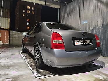 2003: Nissan Primera: 2003 г. — 8