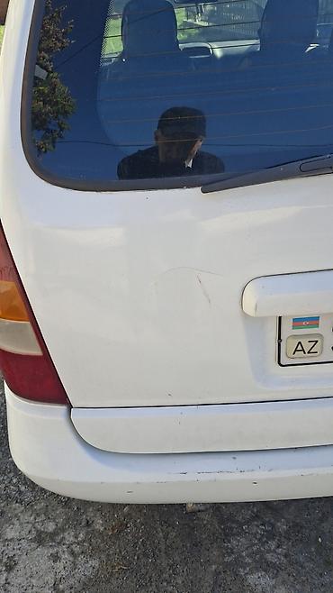 avtomobil kreditlə: Opel Astra Caravan (Universal) – ağ rəngdə, 5 qapı Mühərrik və — 6