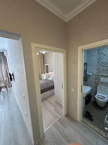 Квартиры: 2 otaqlı mənzil – zövqlü şəkildə tam mebellidir Plan: - Geniş qonaq — 2