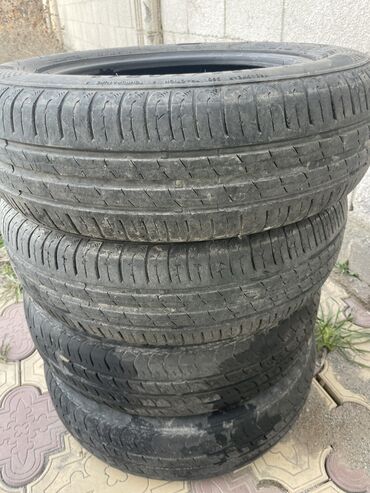 Шины: Продаю б/у шины 155/70R13 цена 2500 сом за комплект. Хорошем состоянии