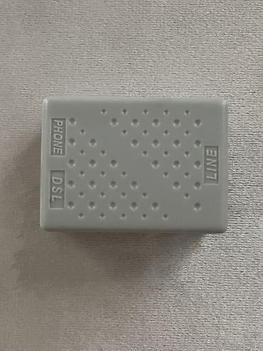 adaptör: D-Link DSL-2640U ADSL2+ Wi-Fi modemi satılır. Tam işlək vəziyyətdədir — 7