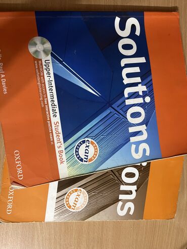книга solutions pre intermediate: Solutions учебник по английскому языку (в комплекте книга + рабочая