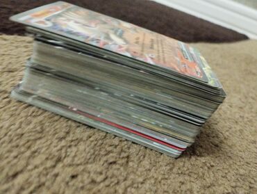 idman çanta: 120 pokemon kartı əla və keyfiyyətlidir. Hamısına 1040 manat ala