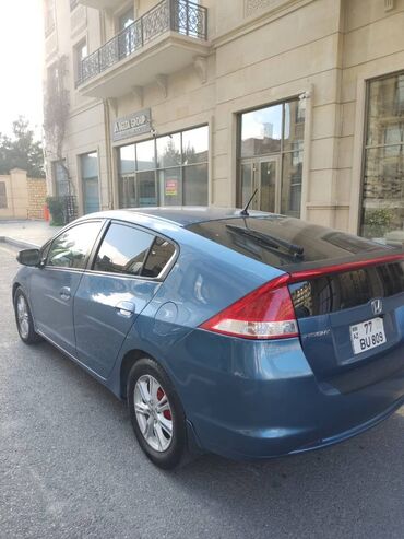 Honda: Honda Insight: 1.3 l | 2010 il — 8
