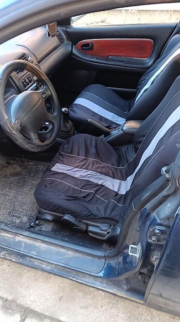 Mazda: Mazda 323: 1.5 l | 1996 г. Hečbek — 5