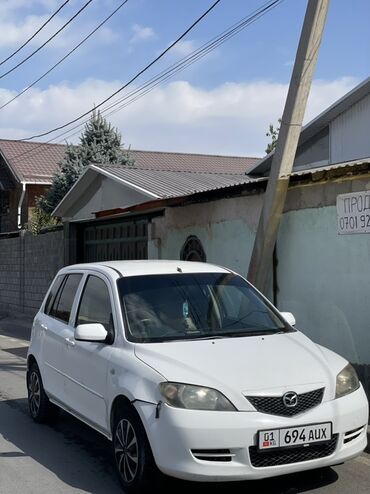 чехол на демио: Mazda Demio: 2003 г., 1.3 л, Автомат, Газ, Хэтчбэк