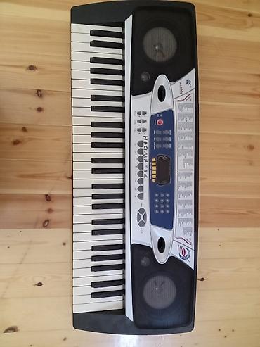 Elektron klaviatura / sintezator - 54 klavişli portativ sintezator