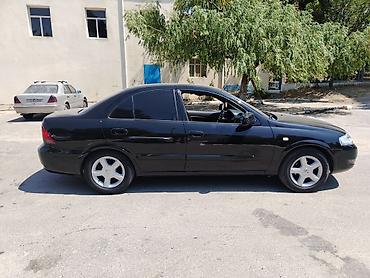 Транспорт: Nissan Sunny: 1.6 л | 2008 г. Седан — 7