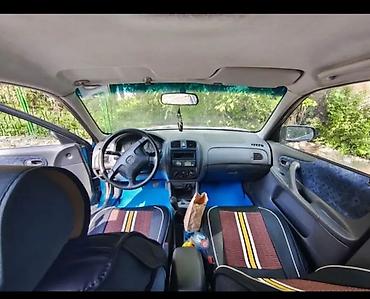 Mazda: Mazda 323: 1999 г., 1.5 л, Механика, Бензин, Универсал — 5