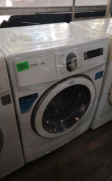 Samsung ön yükləməli paltaryuyan maşın. Ağ rəngdə korpus, geniş