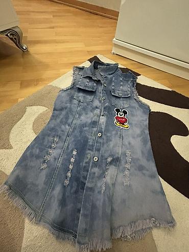 Üst geyimi: Cins uzun jilet/kofta - Material: açıq mavi yuyulmuş denim - Model — 2
