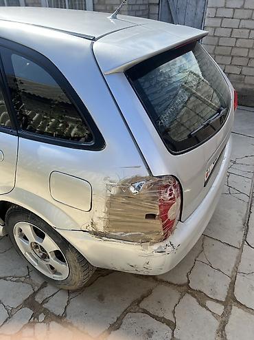 Другие автомобили: Серебристый универсал, 5‑дверный. Основные особенности: - Кузов — 7