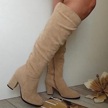 solo obuca baletanke: Zenske cizme do kolena NOVO!

36-41

Cena 3590 din

DM — 1