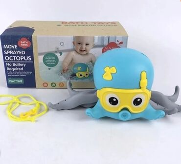 детские каталки: Детская развивающая Заводная игрушка для ванны."Ползающий осьминог"