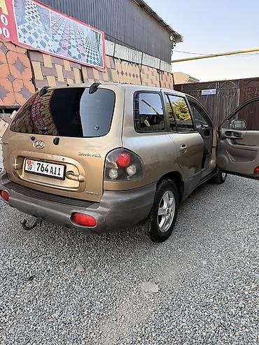 ali osman: Hyundai Santa Fe: 2003 г., 2.7 л, Автомат, Бензин, Кроссовер — 4