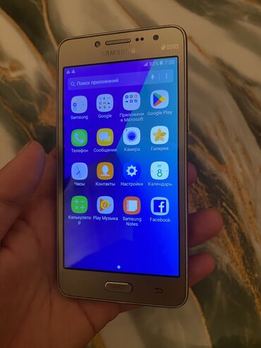 мини телефон сенсорный: Samsung Galaxy Grand 2, Б/у, 8 GB, цвет - Золотой, 2 SIM