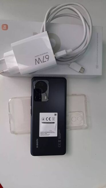 xiaomi 12t qiymeti: Xiaomi 13 Lite, 256 ГБ, цвет - Черный, 
 Отпечаток пальца, Две SIM карты, Гарантия