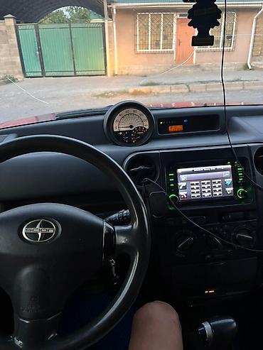 мятины: Представлен автомобиль Toyota bB, отличающийся футуристическим — 6