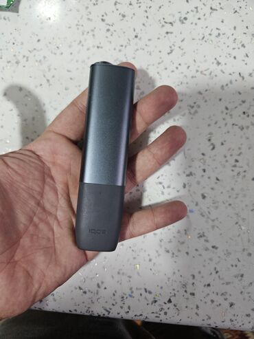 Elektron Tütün qızdırıcı İqos yenidən fərqlənmir alınannan bir paçka