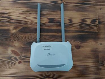 Audio: TP-Link Wi‑Fi router - Marka/model: TP-Link (üzərində “TP-Link”