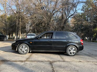 Mazda: Mazda 323: 2002 г., 1.6 л, Механика, Бензин, Хэтчбэк — 4