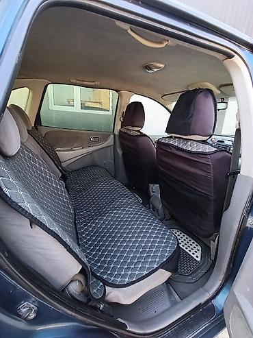 kamri 70: Nissan Almera Tino: 2001 г., 1.8 л, Механика, Бензин — 5