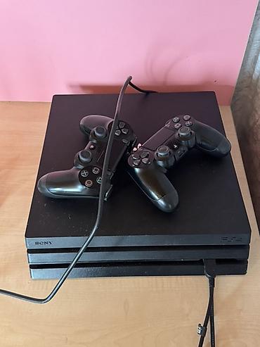 playstation 4 pro oyunları: Məhsul: Sony PlayStation 4 Pro oyun konsolu + 2 ədəd DualShock 4 — 1