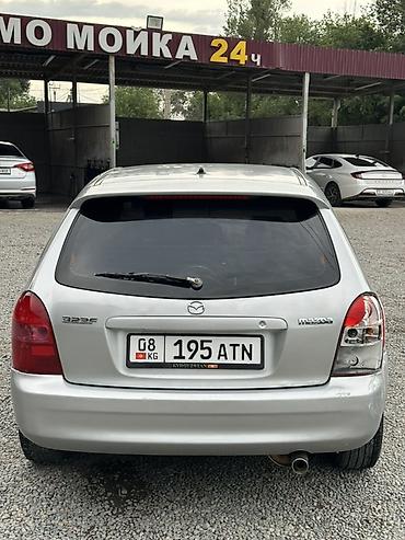 пороги демио: Mazda 323: 2001 г., 1.6 л, Механика, Бензин, Хэтчбэк — 5