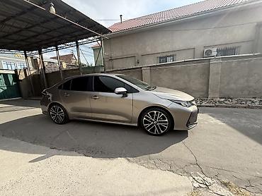 на corolla: Toyota Corolla: 2021 г., 1.8 л, Автомат, Гибрид, Седан — 5