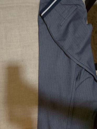 kupaci cacak: Pantalone,velicina 38,dezen riblja kost.Bez ostecenja.Kao nove.Cena — 5