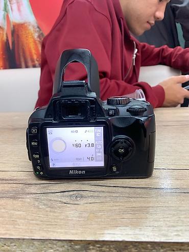 Зеркальная камера Nikon с комплектным зум-объективом AF‑S DX NIKKOR