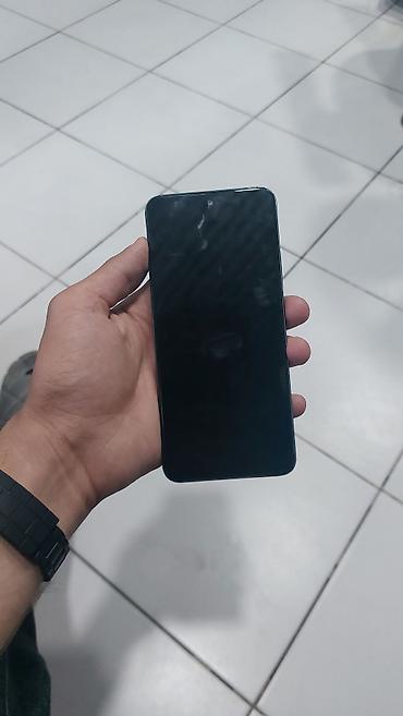 vətən n muhafizə: Smartfon – arxa tərəfində “DİN” yazılı qalxan və qılınc simvollu — 1