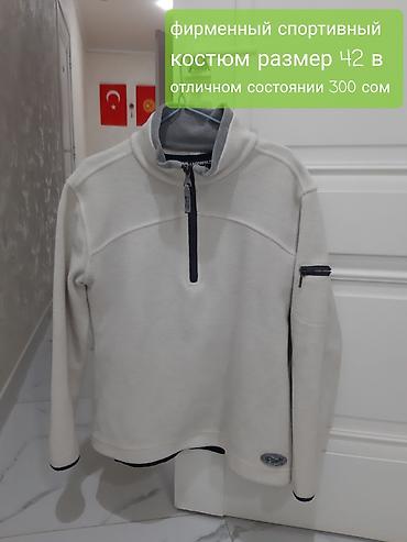 Брюки: Джоггеры с камуфляжным принтом и карманами карго, выполненные в — 27