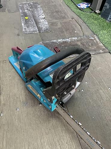 Пилы: Бензопила Makita (цвет бирюзовый) с шиной 20" (50 см) - Тип — 1