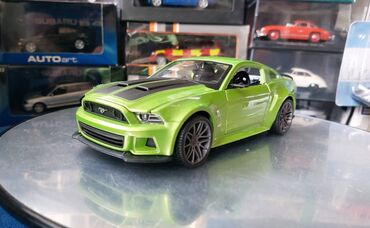 Avtomobil modelləri: Коллекционная модель Ford Mustang Street Racer Green black 2014 — 11