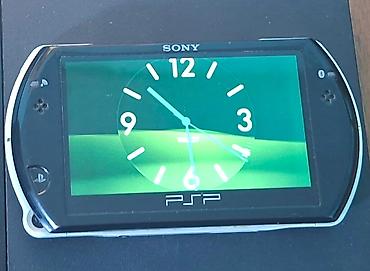 psp konsol: PSP Go satılır. Konsol çox səliqəli istifadə olunub və tam işlək — 1