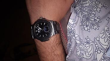 nike saat: Patek Philippe Nautilus üslubunda mexaniki qol saatı - Korpus və — 1