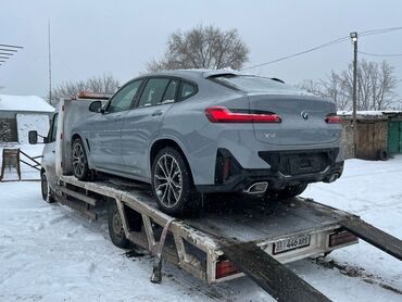 грузовой эвакуатор: Көтөргүсү менен, Гидроманипулятору менен, Сынган платформасы менен